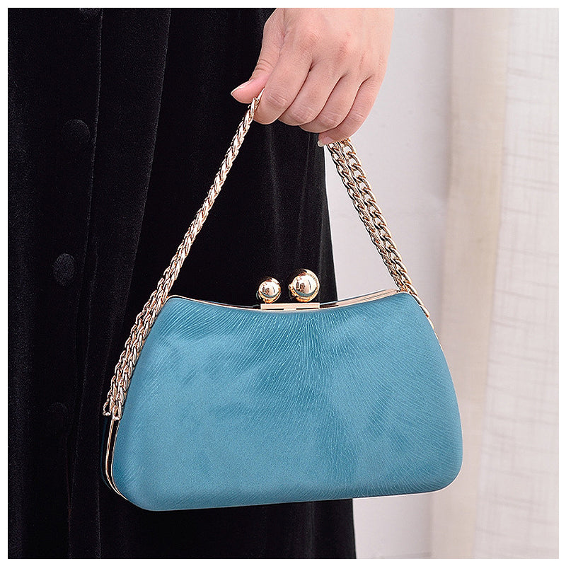  The Lucy Clutch Bag